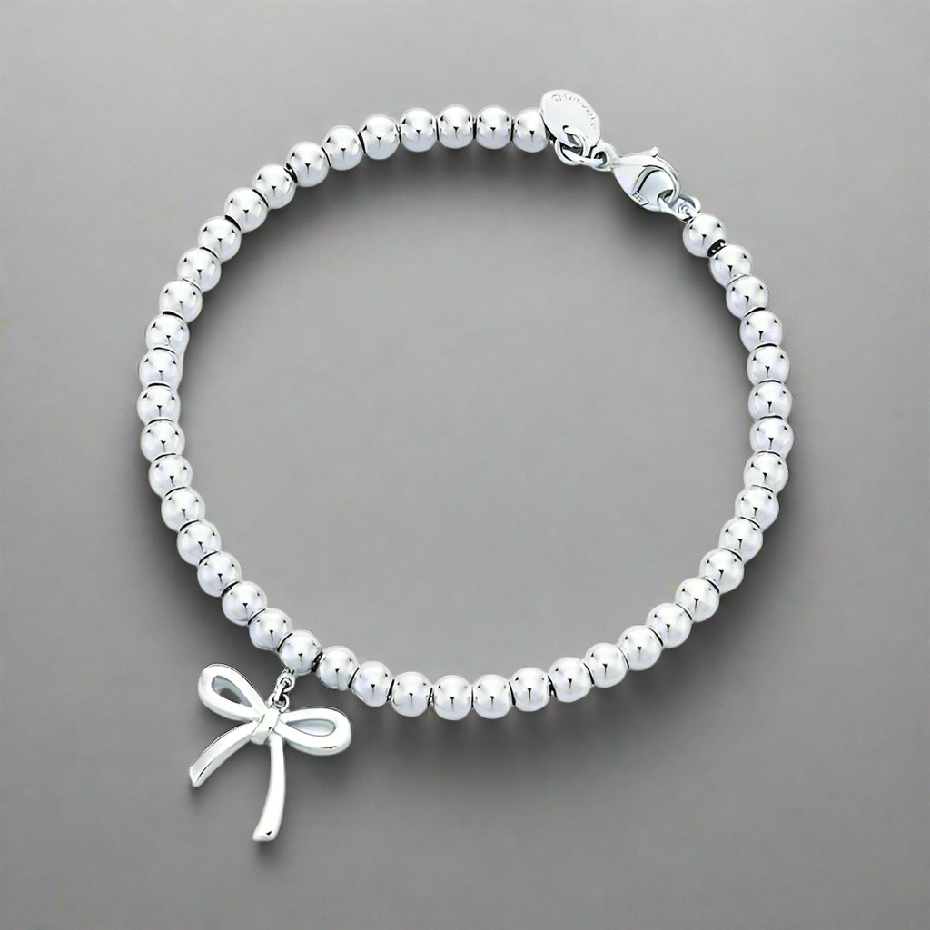 18K T Bow Charm Bead Bracelet